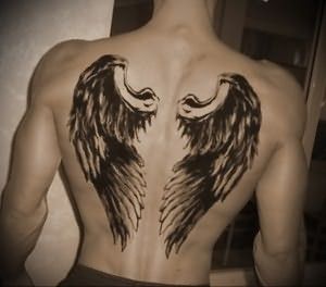 Значение татуировки крылья на спине 10