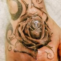 Что означает роза тату 2