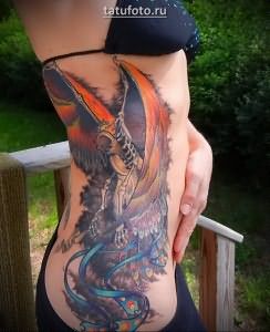 Смерть в татуировке с фениксом