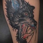 что значат татуировки с оскалом волка – фото