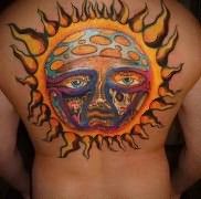 татуировка солнце на всю спину и скелеты