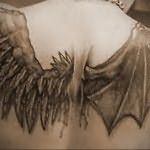 Значение татуировки крылья на спине 8