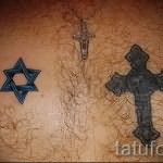 пример татуировки со зведой давида на фото 13