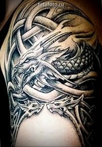 Тату дракон на плече и украшение из кельтских узоров