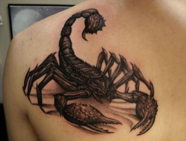 татуировка в виде скорпиона