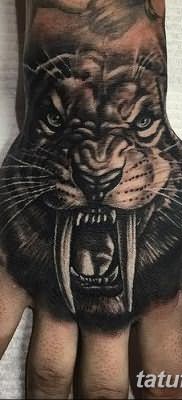 фото тату саблезубый тигр от 25.07.2017 №006 – Tattoo saber-toothed tiger