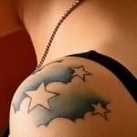 татуировка облага и звезды на плече