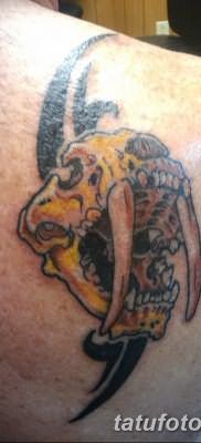 фото тату саблезубый тигр от 25.07.2017 №013 – Tattoo saber-toothed tiger