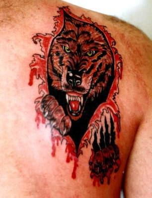 татуировка волка на плече значение