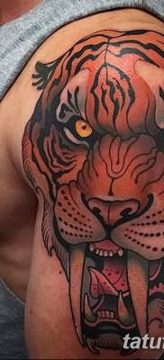 фото тату саблезубый тигр от 25.07.2017 №044 – Tattoo saber-toothed tiger