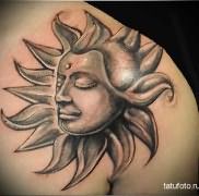 татуировка солнце с лицом будды