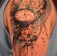 Значение татуировки часы 3