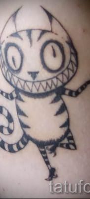 Фото тату Чеширский кот для статьи про значение рисунка татуировки – tatufoto.ru – 15