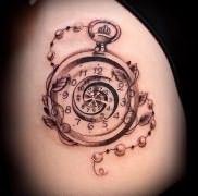 Значение татуировки часы 4