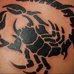 Значение татуировки скорпион 7