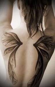 Значение татуировки крылья на спине 9