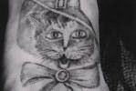 Блатная тату с котом – на удачу и символизирует осторожность